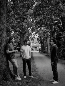 Jesse Rómlárson, Eoin Belfield and Nevan Lochlann talking at Deerpark in Mount Merrion, Dublin during the early years of Eventstellar in 2016