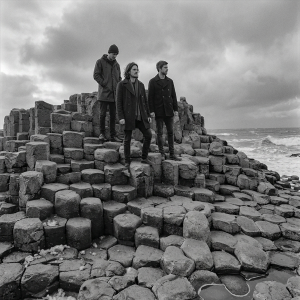 Jesse Rómlárson, Eoin Belfield and Nevan Lochlann at Giant's Causeway in Northern Ireland during the early years of Eventstellar in 2016