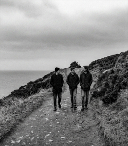 The members of Sojourner walking along the coastal path in Howth north of Dublin overlooking the Irish Sea