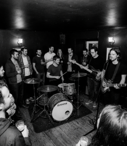 Eventstellar performing an intimate pub session surrounded by friends in Bray, Ireland