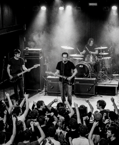 Sojourner performing before a packed audience during one of the band's final Mexican shows in 2015
