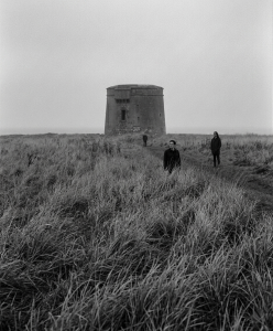 Jesse Rómlárson, Eoin Belfield and Nevan Lochlann near a Martello tower in Dublin during the early years of Eventstellar in 2016