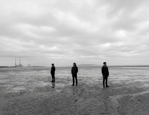 Jesse Rómlárson, Eoin Belfield and Nevan Lochlann at Sandymount Strand in Dublin during the early years of Eventstellar in 2016
