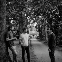 Jesse Rómlárson, Eoin Belfield and Nevan Lochlann talking at Deerpark in Mount Merrion, Dublin during the early years of Eventstellar in 2016