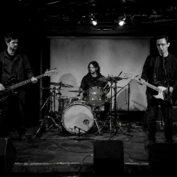 Nevan Lochlann, Eoin Belfield and Jesse Rómlárson performing live in Shannon, Ireland during the early years of Eventstellar
