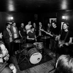 Eventstellar performing an intimate pub session surrounded by friends in Bray, Ireland