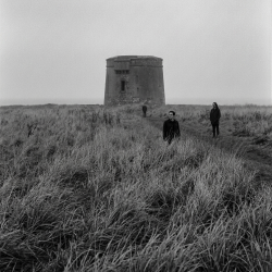 Jesse Rómlárson, Eoin Belfield and Nevan Lochlann near a Martello tower in Dublin during the early years of Eventstellar in 2016