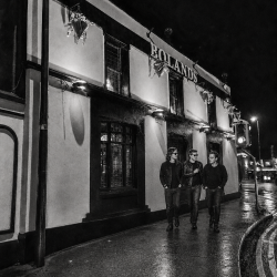 Jesse Rómlárson, Eoin Belfield and Nevan Lochlann walking outside Boland's in Dublin after a recording session during the early years of Eventstellar in 2016