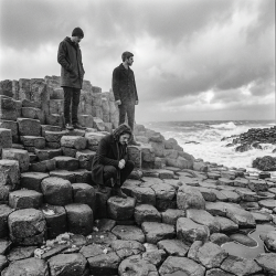 Jesse Rómlárson, Eoin Belfield and Nevan Lochlann at Giant's Causeway in Northern Ireland during the early years of Eventstellar in 2016